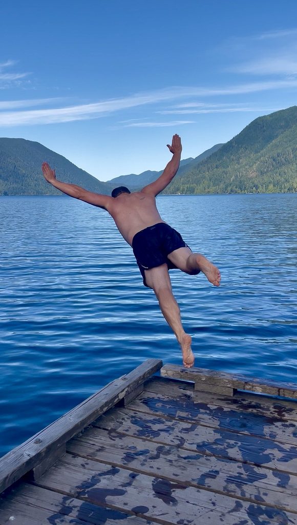 Jumping off the dock into Lake Crescent.